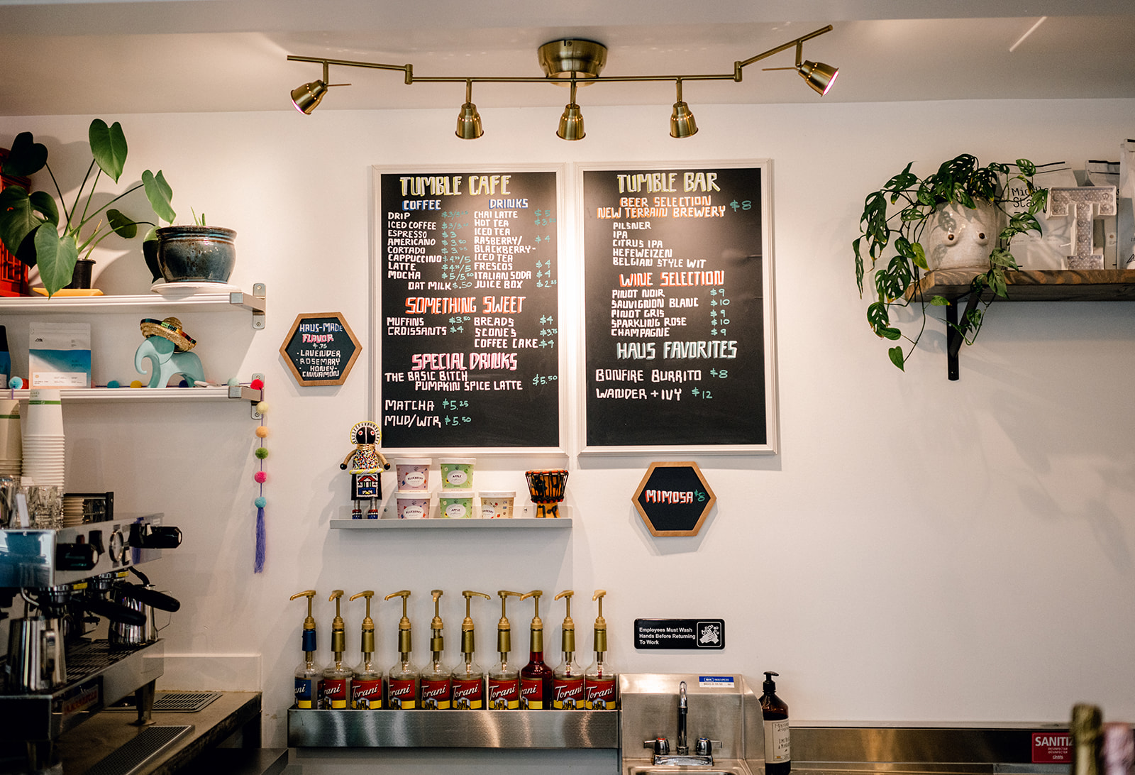 Tumble Cafe and Tumble Bar chalkboard menu with coffee and wine at tumble HAUS Denver